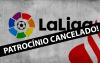 Arte composta pelo logo da LaLiga, pelo logo do Santander e por uma faixa negra com letras brancas sobre os logos, onde se lê: patrocínio cancelado